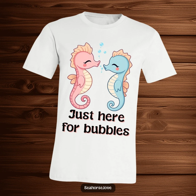 Funny giggling seahorse blowing tiny air bubbles toward another, printed on a soft, comfortable t-shirt for ultimate humor.